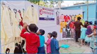 ‘এক টাকায়’ পোশাক পেয়ে খুশি সৈয়দপুরের পথশিশুরা