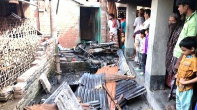 নওগাঁয় লুটপাটের পর পুড়িয়ে দেওয়া হলো বসতবাড়ি, গ্রেপ্তার ৯